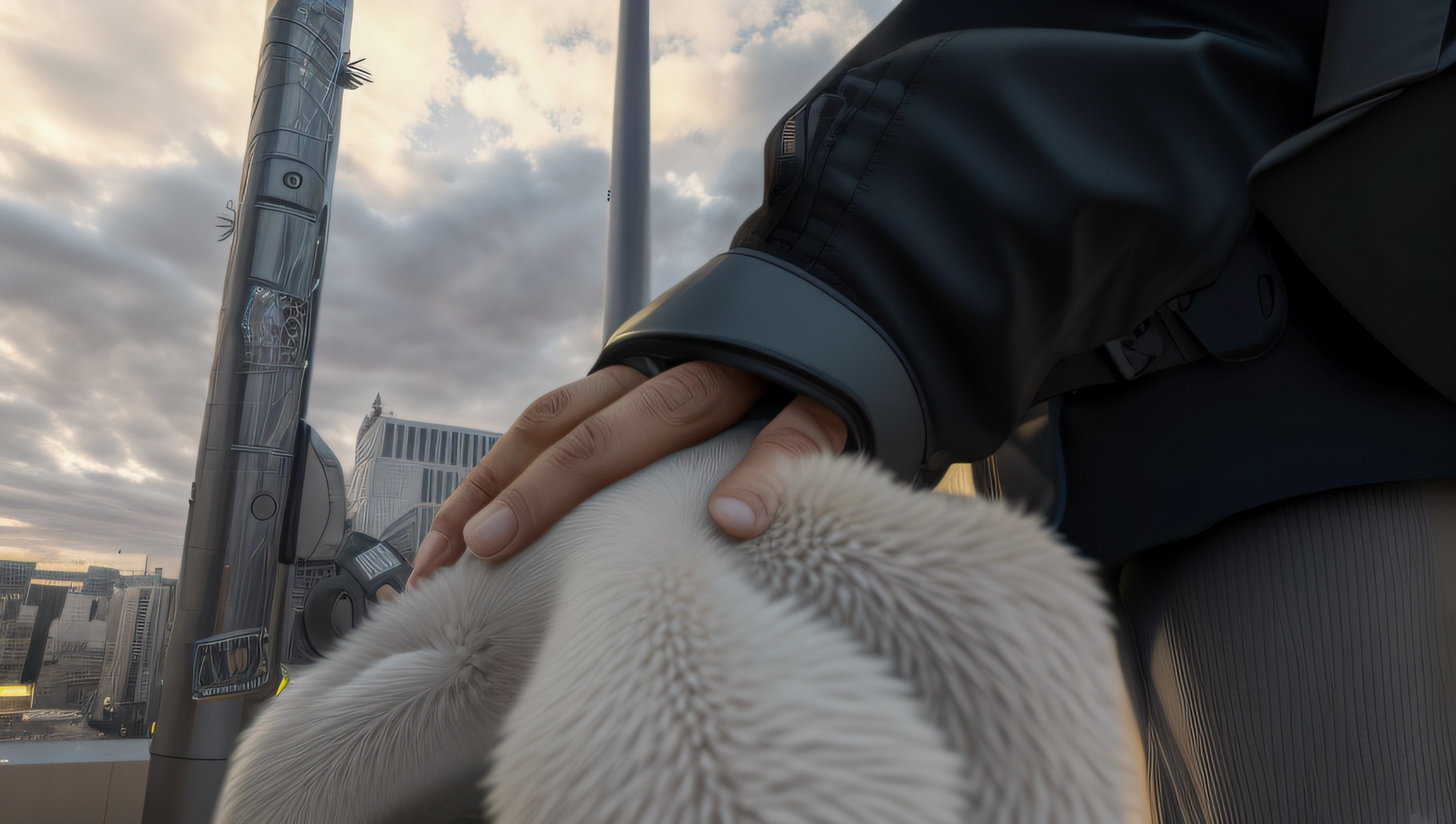 Close-up video still of a hand resting on a dog's white fur, city street with a lamppost visible against a cloudy sky